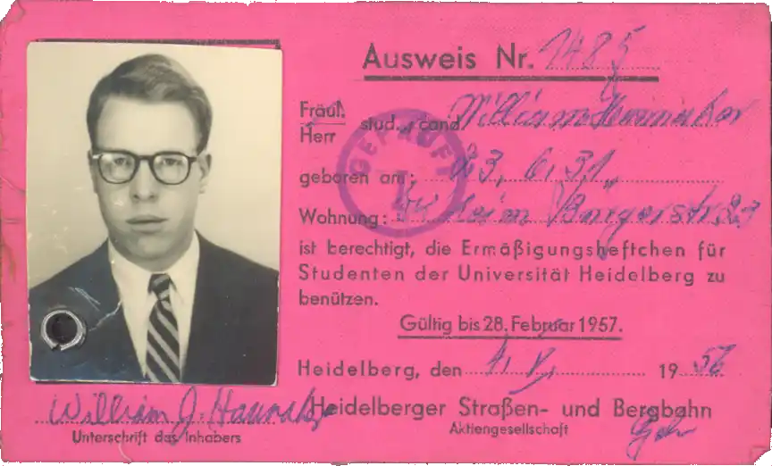 A scan of a deep pink identity card issued in 1956 in Heidelberg.