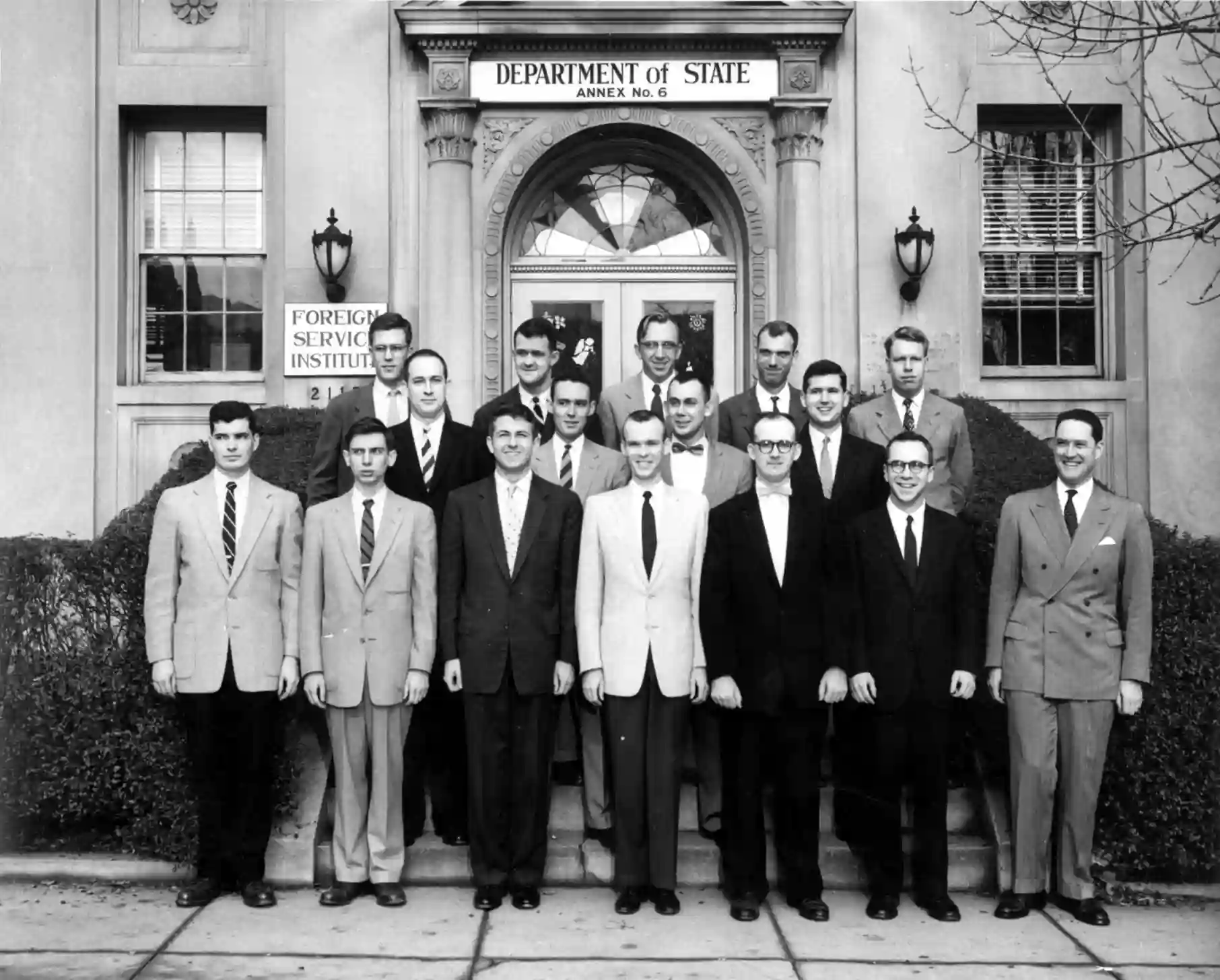 A photograph of suit-wearing men ready for training at the Foreign Service Institute.